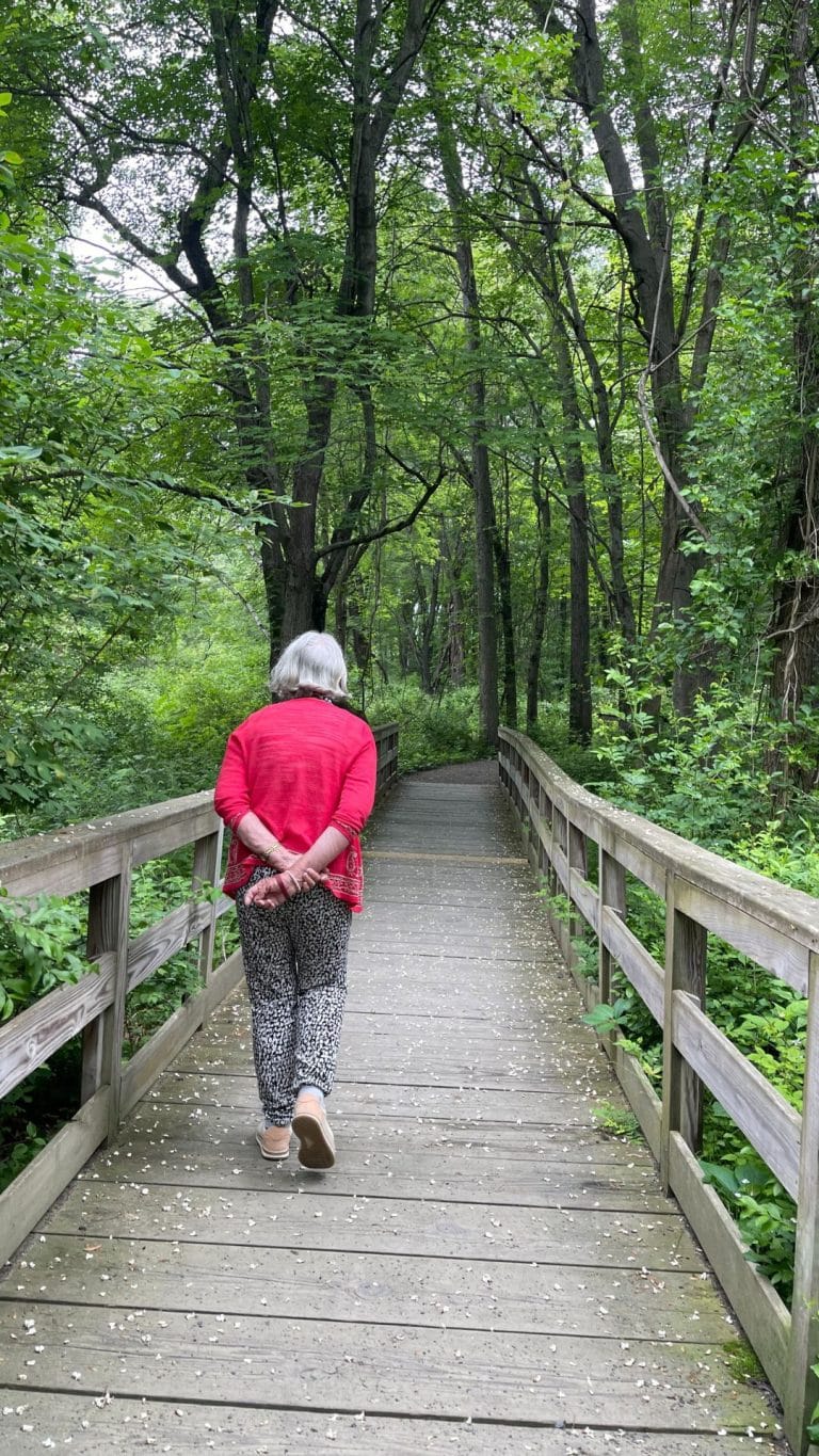 A woman on a walk at the Siivio O. Conte wildlife refuge - FungaiFoto