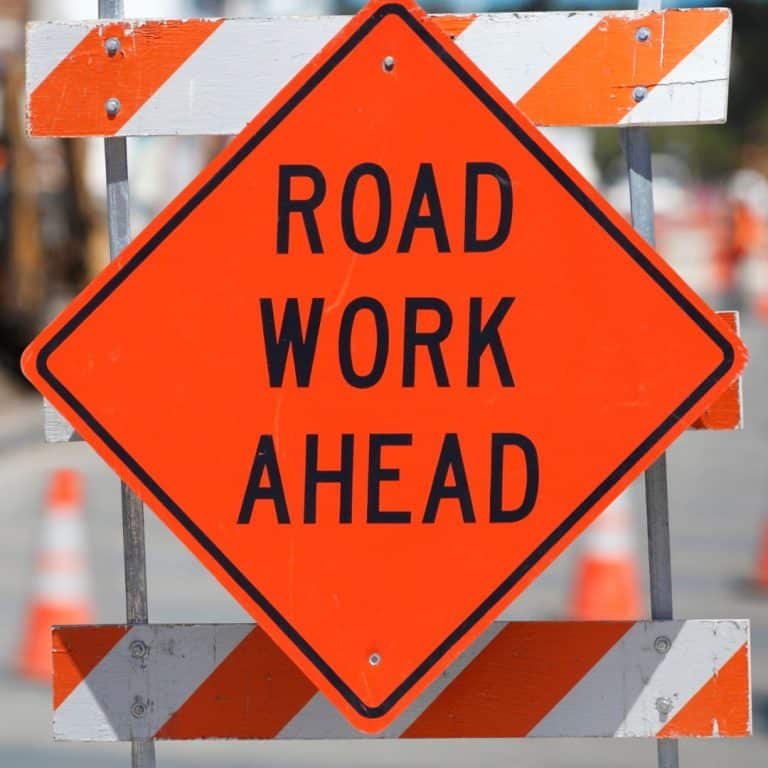 A 'Road Work Ahead' sign