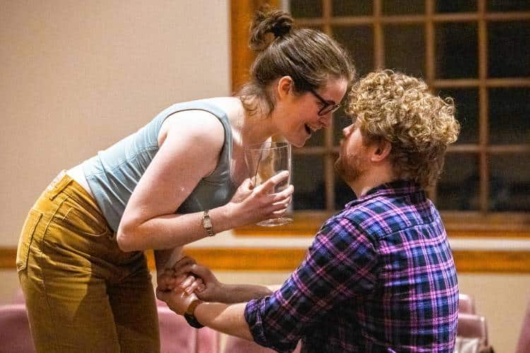Lindsey Campbell, left, and Terrance J. Peters, center, rehearse Valley Players' production of "Constellations" at Munson Memorial Library in Amherst on Oct. 7, 2024.