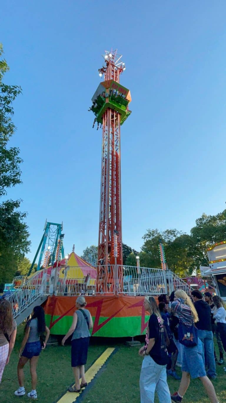 Visitors enjoy a ride on 'The Ripcord', one of the rides at the Amherst Rotary Town Fair. August 23, 2025. FungaiFoto.
