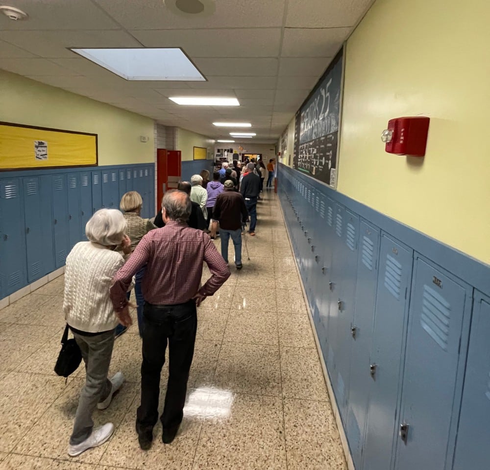 Hadley residents wait to get ballots for the override vote at the special town meeting on September 9, 2025.