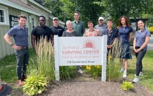 Community-focused. Owwtreach Founder, Fungai Tichawangana (Second from Left), with Amherst Area Chamber of Commerce members & staff and Amherst Survival Center Staff during a volunteer event in June 2025.