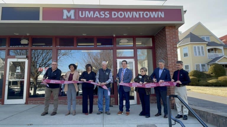 Umass Amherst Chancellor, Javier Reyes (4th from Right) is joined by town officials and UMass staff at the official opening of UMass Downtown, March 2025