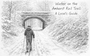 A sketch of a a person walking alone on a snow-covered rail trail.